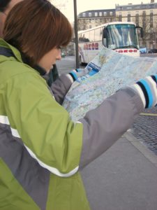 GIRL STUDYING A MAP-following God