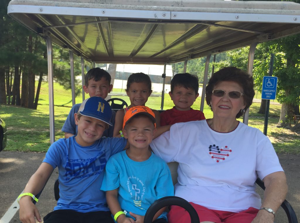 Kids in the golf cart-COUSIN CAMP AT JELLYSTONE PARK