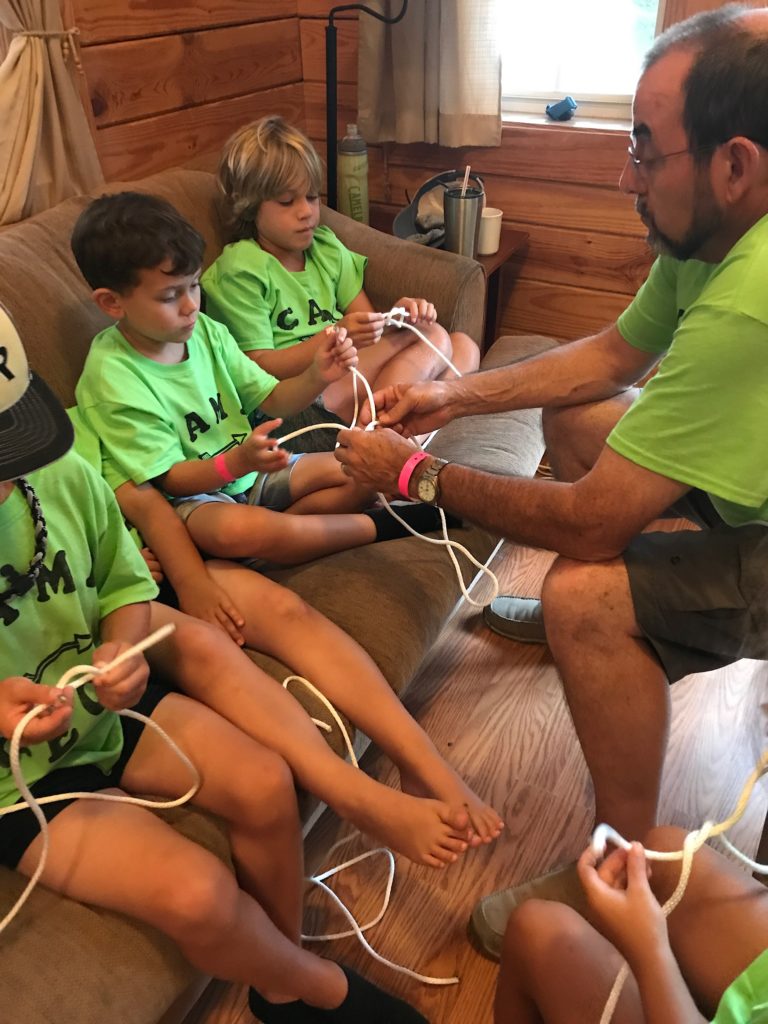 LEARNING TO TIE KNOTS-COUSIN CAMP