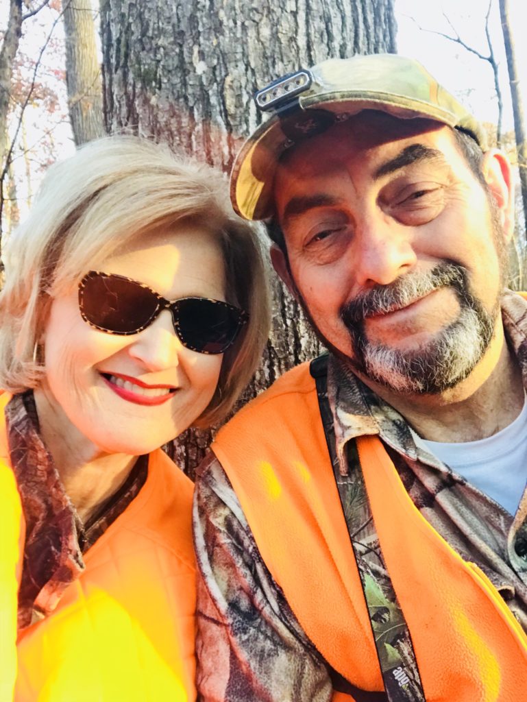 My husband and I in a deer stand
